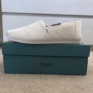 TOMS Ivory Canvas Slip-Ons